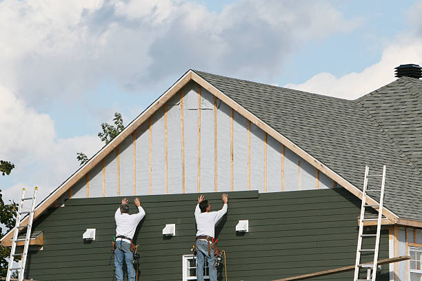 Professional Siding technician working in Claremont, NC